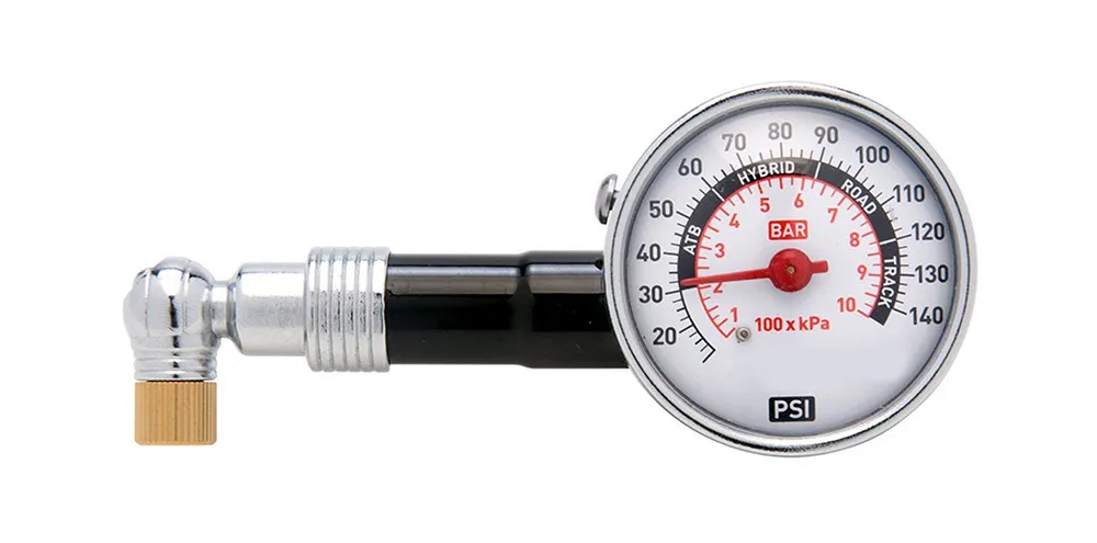 Tire pressure check with gauge